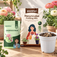 Paakhuri Ranunculus Potting Mix and Ranunculus Bulbs set displayed on a wooden table with a white pot containing soil, surrounded by potted flowers.