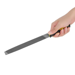 Hand holding a metal file against a white background